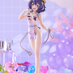 Full-body front shot of the Pop Up Parade L Magia Baiser Naked Apron Version figure displayed inside a pastel purple diorama backdrop with gems and decorations.