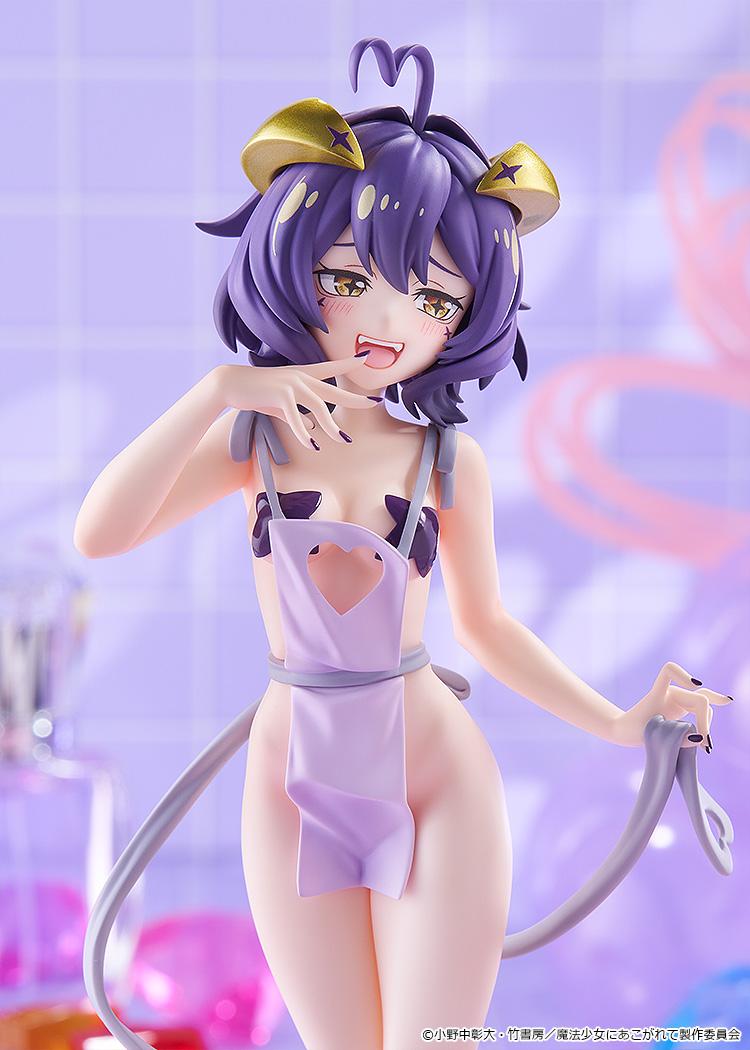 Waist-up photo of the Magia Baiser Naked Apron Version figure set in a colorful pastel diorama with soft purple lighting.