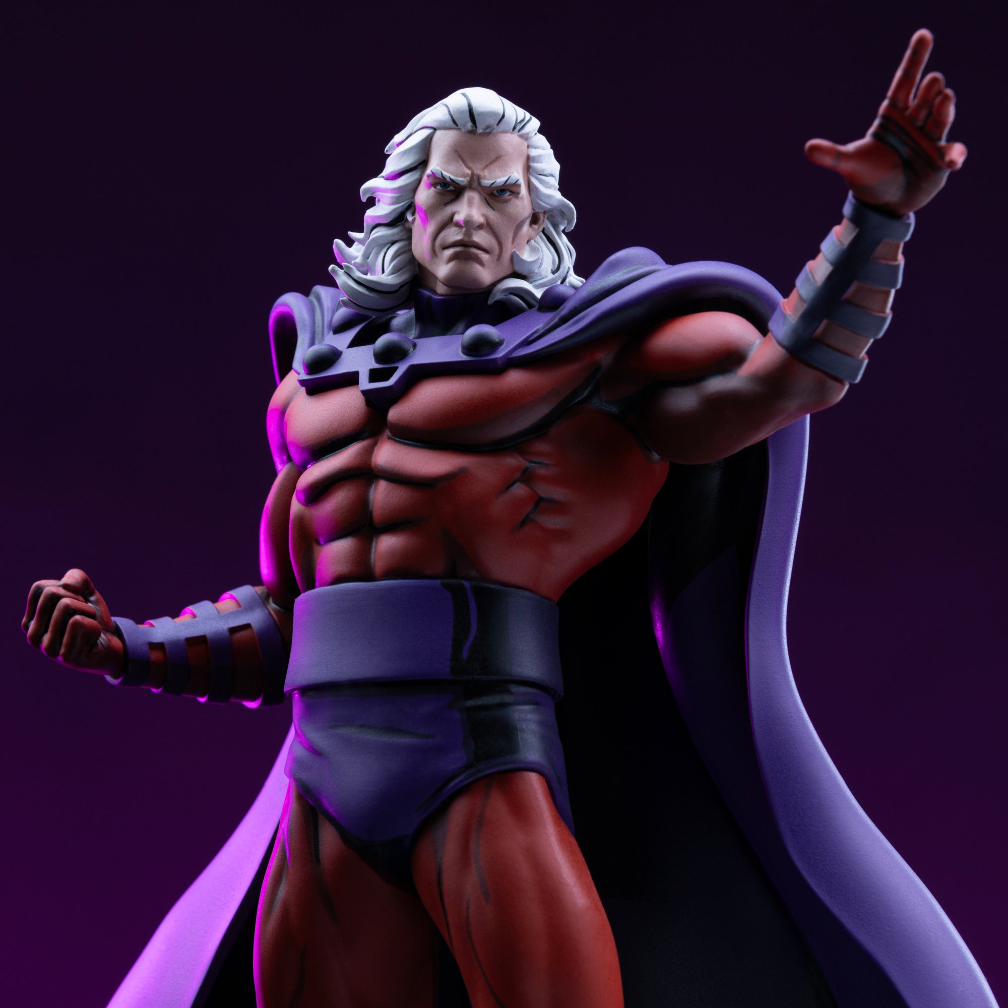 Dramatic waist-up close-up of the unmasked Magneto statue under purple lighting, emphasizing his white hair sculpt and stern expression.