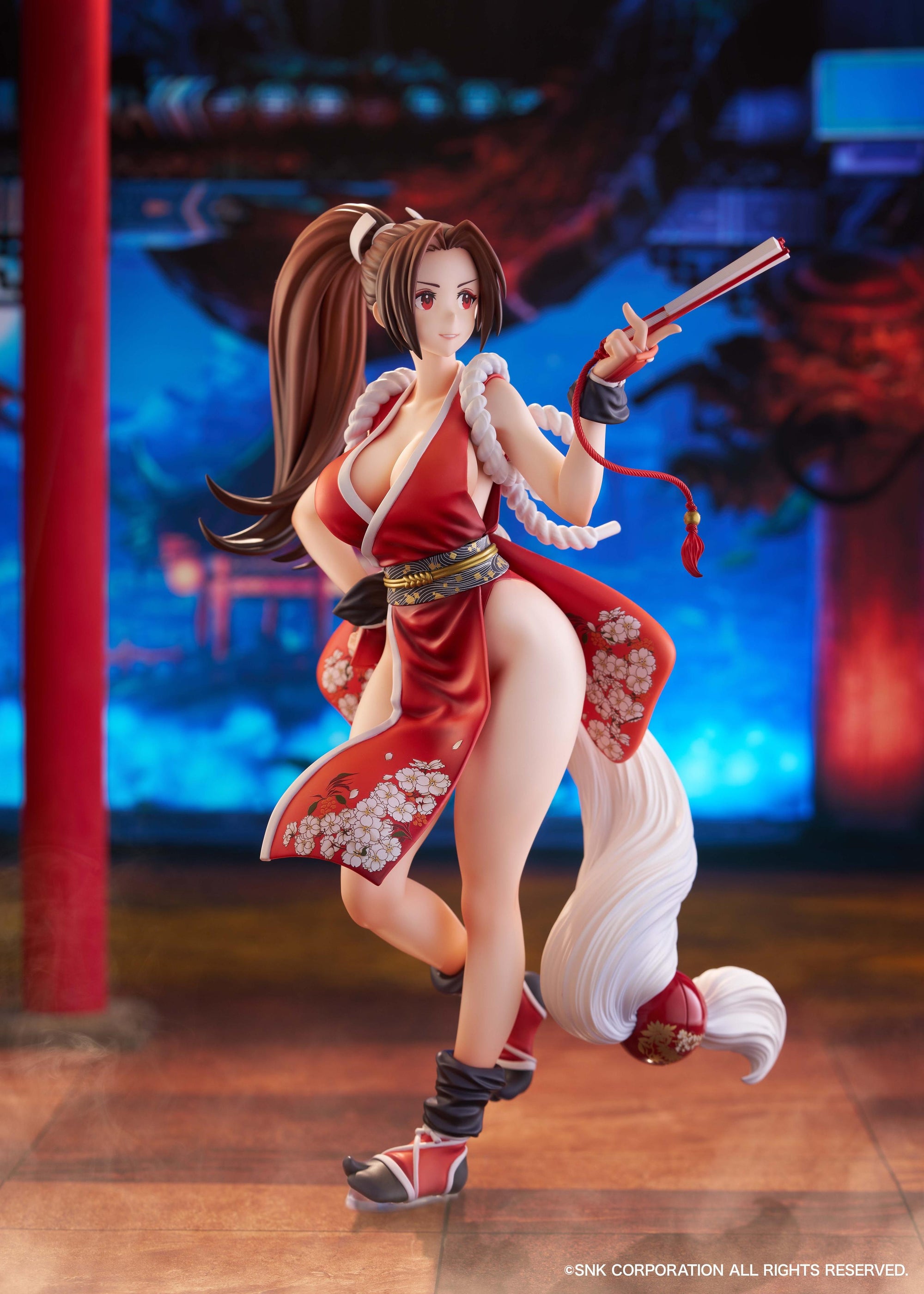 Cinematic shot of Mai Shiranui figure displayed against a traditional Japanese temple background.
