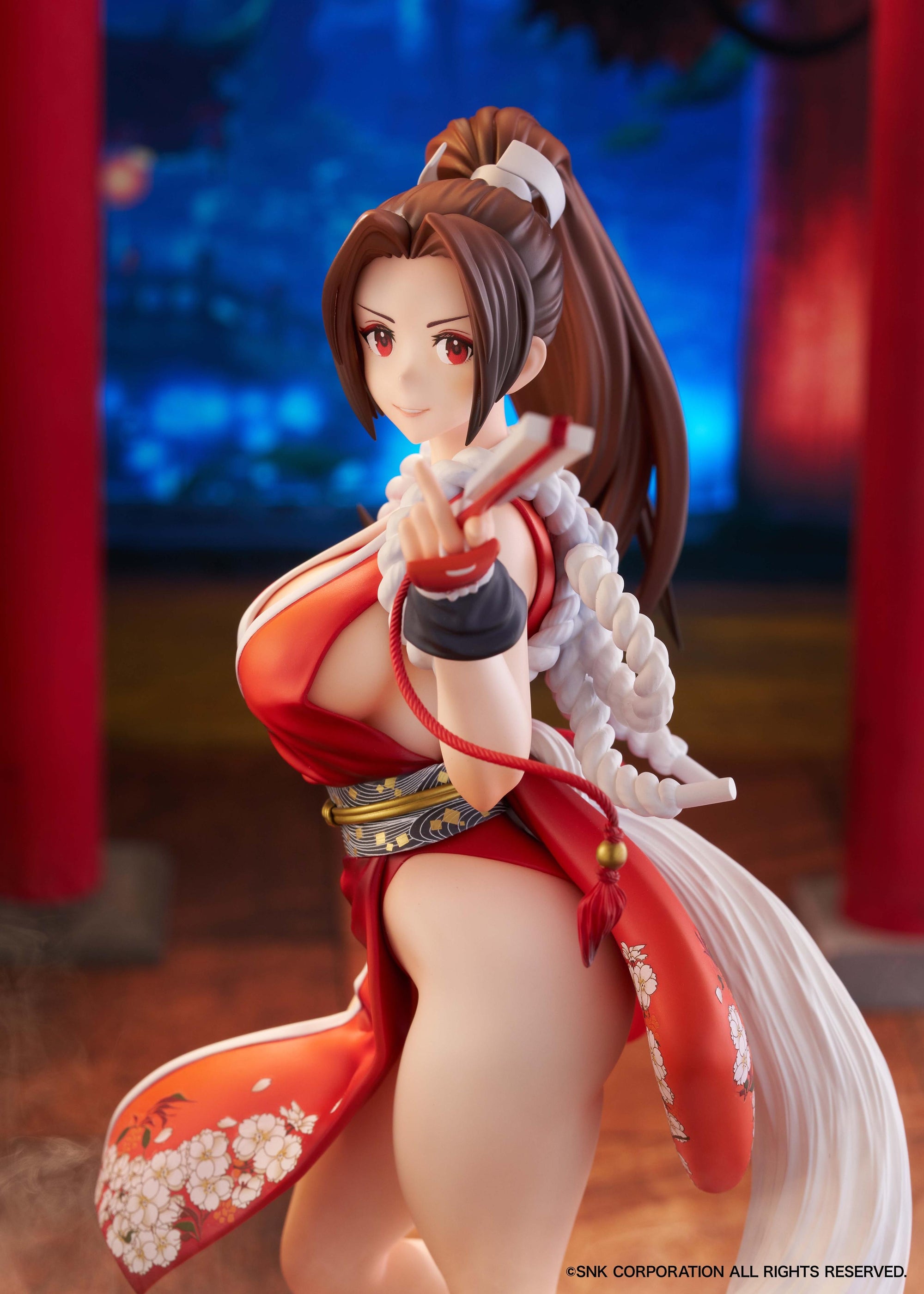 Atmospheric close-up shot of the Mai Shiranui figure capturing the allure and confidence of the character.