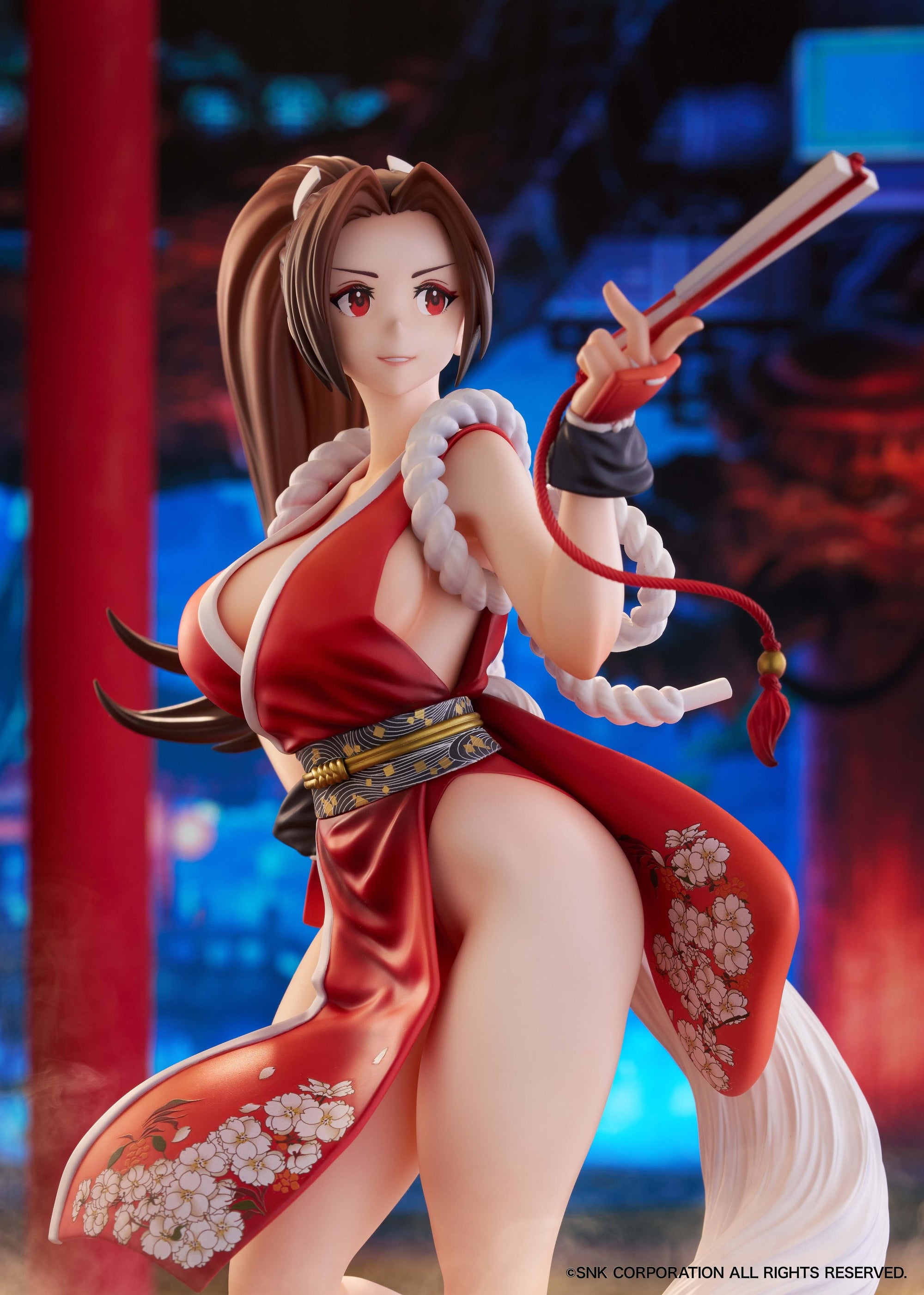 Side view cinematic photo of Mai Shiranui preparing her signature Shiranui-ryu Ninjutsu move.