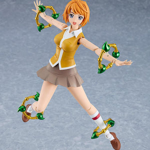 Dynamic action pose of the Mai Tokiha PLAMATEA plastic model kit featuring element rings.