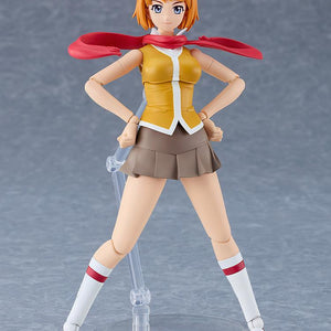 Mai Tokiha plastic model kit in a confident hands-on-hips pose wearing a red scarf.