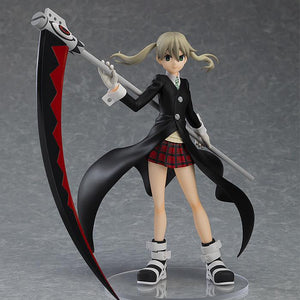 Studio shot of Maka Albarn in her iconic Meister outfit wielding the Soul Evans scythe.