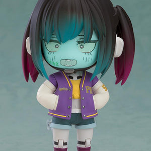 Makina Nendoroid showing a panicked face plate with a jagged mouth and wide eyes, standing with hands behind her back.