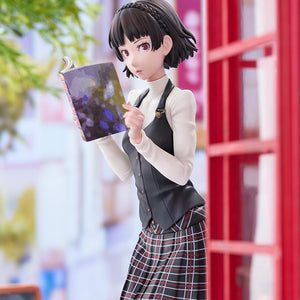 Three-quarter street diorama shot of the Makoto Niijima figure reading by a vintage red phone booth.