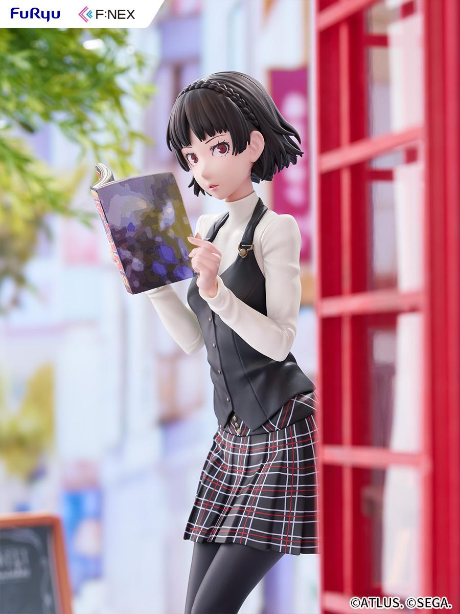 Three-quarter street diorama shot of the Makoto Niijima figure reading by a vintage red phone booth.