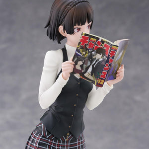 Angled upper-body close-up of Makoto Niijima holding the open Monthly Shonen Chance magazine.