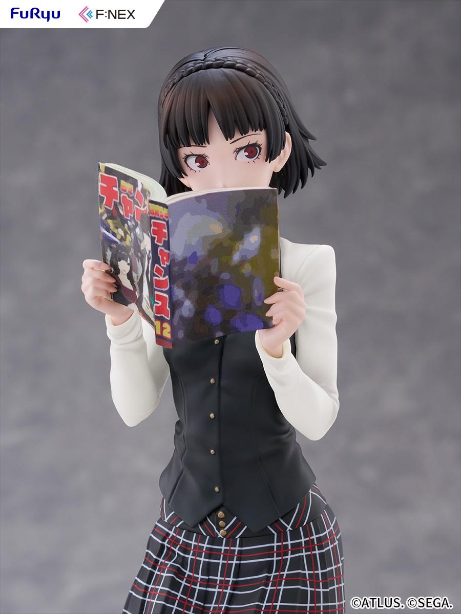 Front view of Makoto Niijima peeking over the Monthly Shonen Chance magazine with a surprised, caught-off-guard facial expression.
