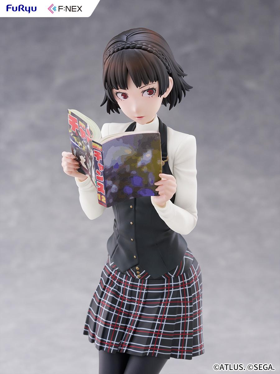 High-angle view of the Makoto Niijima 1/7 scale figure showcasing the detailed magazine print and plaid school uniform skirt.