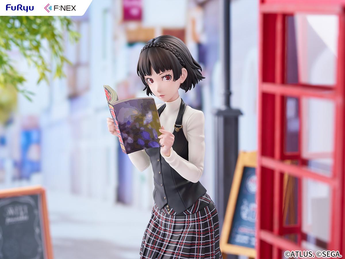 Medium upper-body shot of Makoto Niijima holding the Monthly Shonen Chance magazine in a city street setting.
