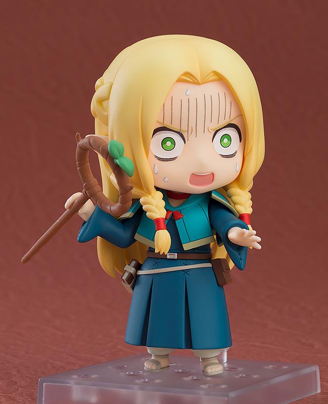 A comical pose of the Marcille Nendoroid using the screaming face plate and frantic hand gestures to show her disgust for dungeon food.