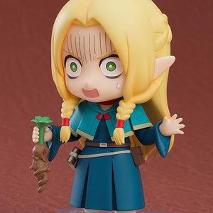 Articulated Marcille Nendoroid with a comical screaming face plate while holding a crying Mandrake root accessory.