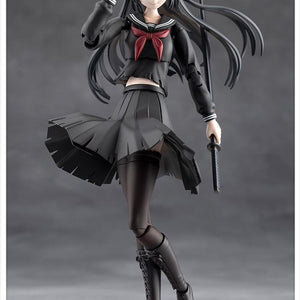 Front view of the black variant figure using her pre-painted bandaged smiling expression part on a studio backdrop.