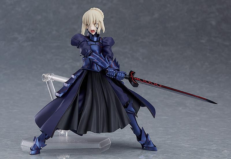 The Saber Alter figma figure in a dynamic action pose, holding Excalibur Morgan above her head, ready to swing.
