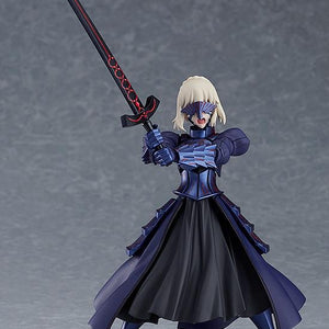 Saber Alter figma figure wielding Excalibur Morgan in a strong, two-handed grip, showing the dark, corrupted armor and billowing skirt.