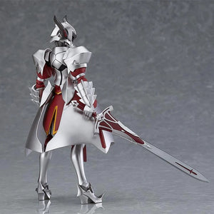 Rear view of the Mordred figma figure, showing the articulated silver armor plates and the flow of her red skirt.