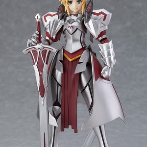 The Mordred figma figure in her full armor, smiling with determination and resting her hand on the hilt of Clarent.