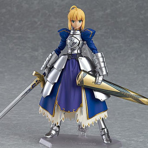 Saber 2.0 figma figure posed with the drawn Excalibur sword in one hand and the ornate scabbard (Avalon) tucked under the other arm.