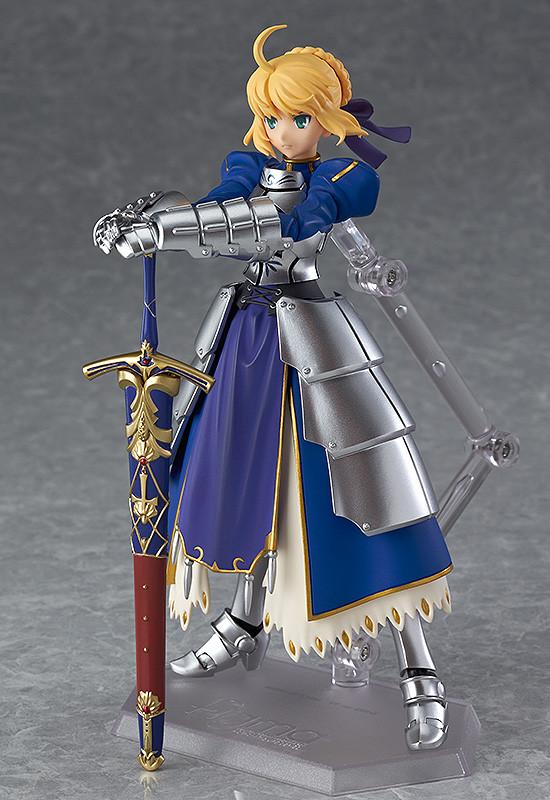 Full frontal pose of the Saber 2.0 figma figure, leaning on the sheathed Excalibur, highlighting the metallic armor and deep blue dress.