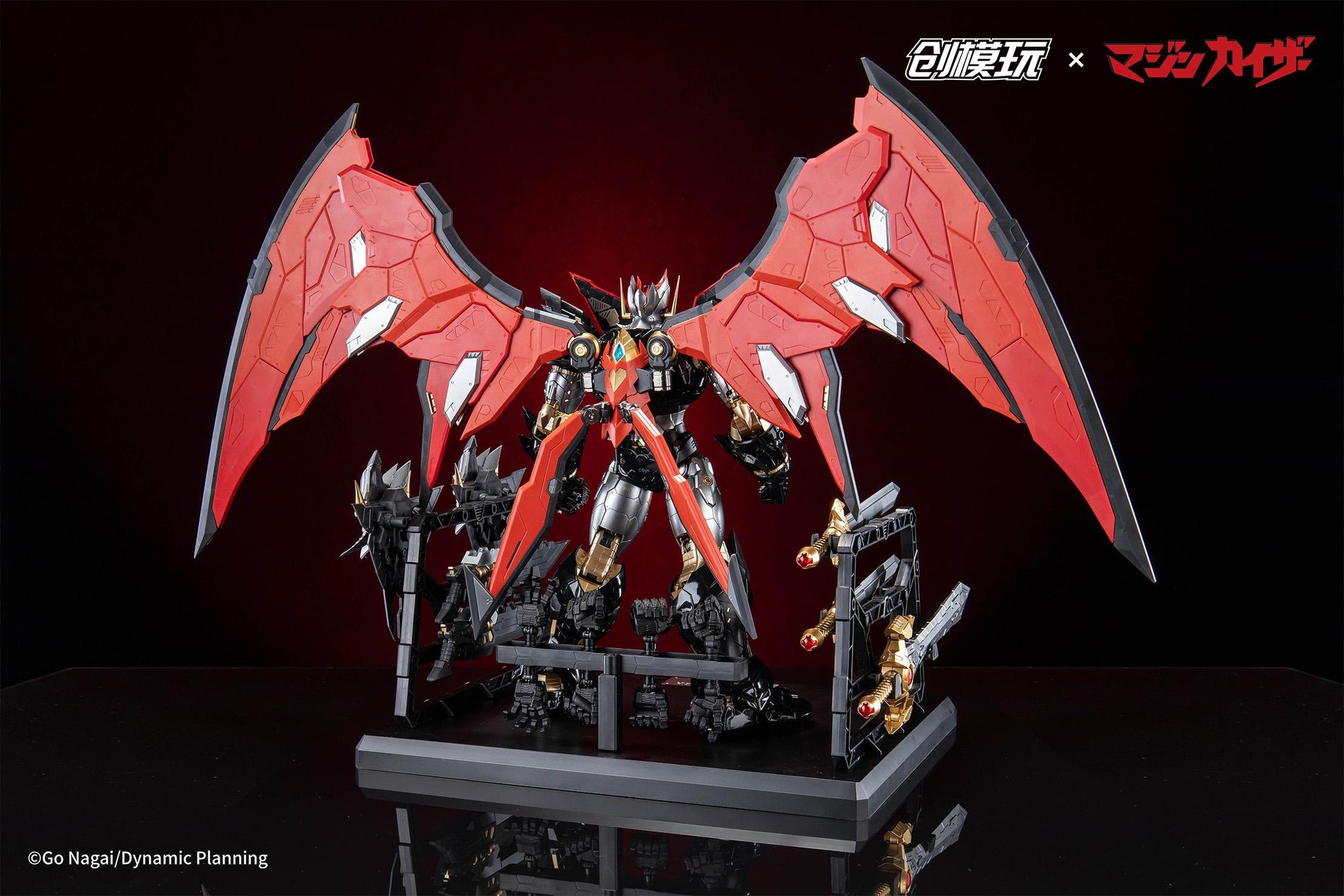Rear view of the display stand showing weapon storage and figure support for Mazinkaiser.