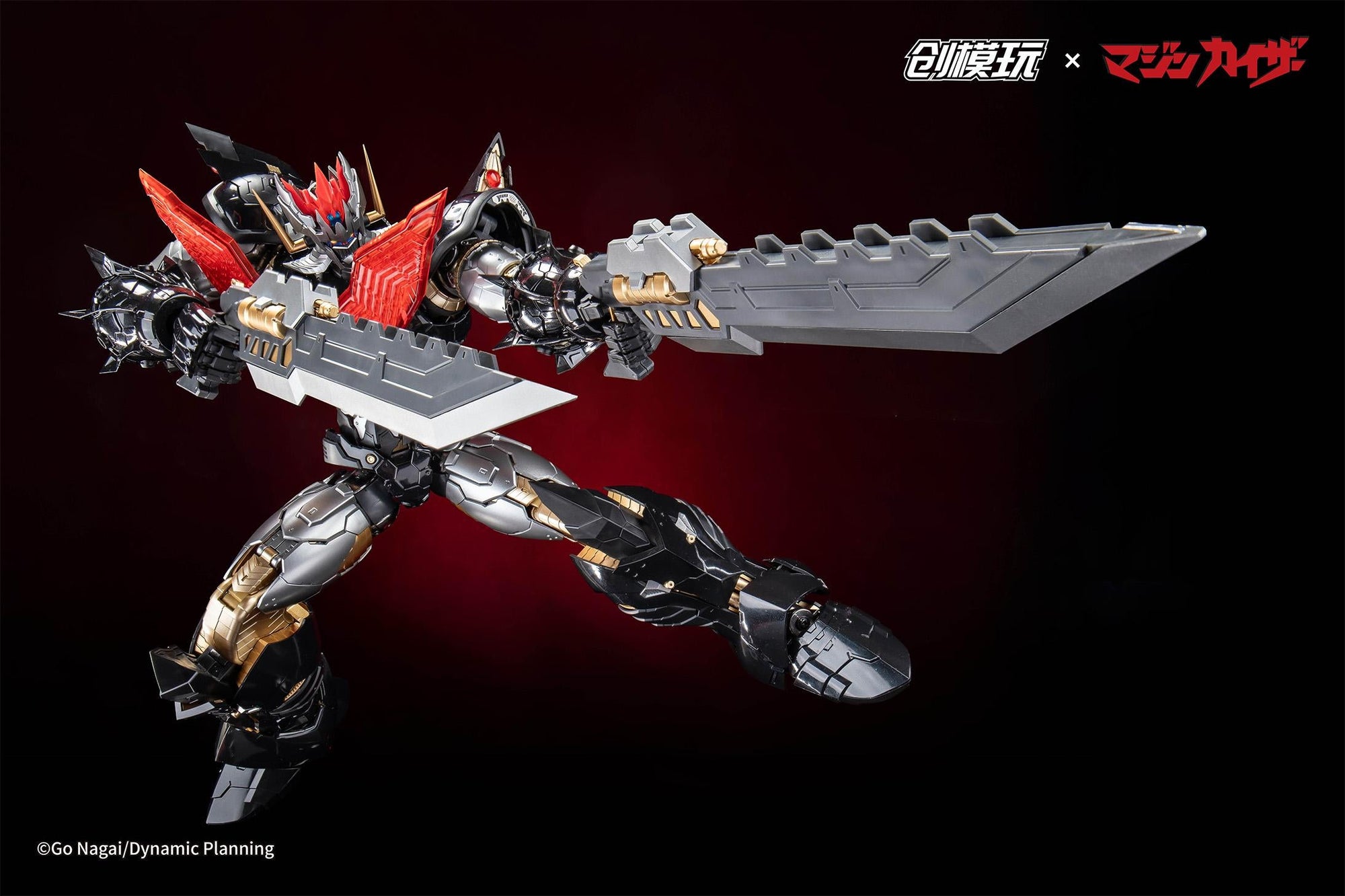Mazinkaiser mecha figure using two large grey Kaiser Bayonets in an aggressive action pose.