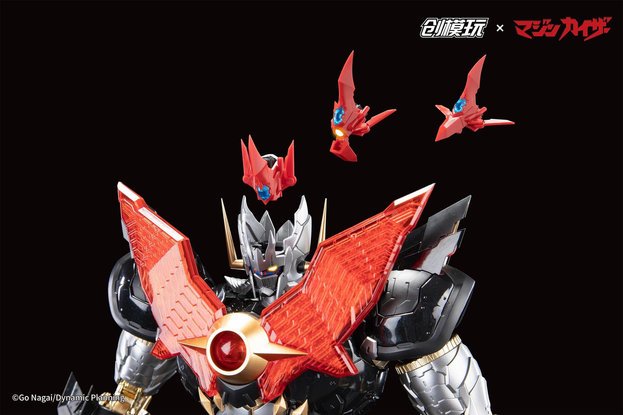 Close-up showing the Kaiser Plider craft docking into the head of the Mazinkaiser mecha.