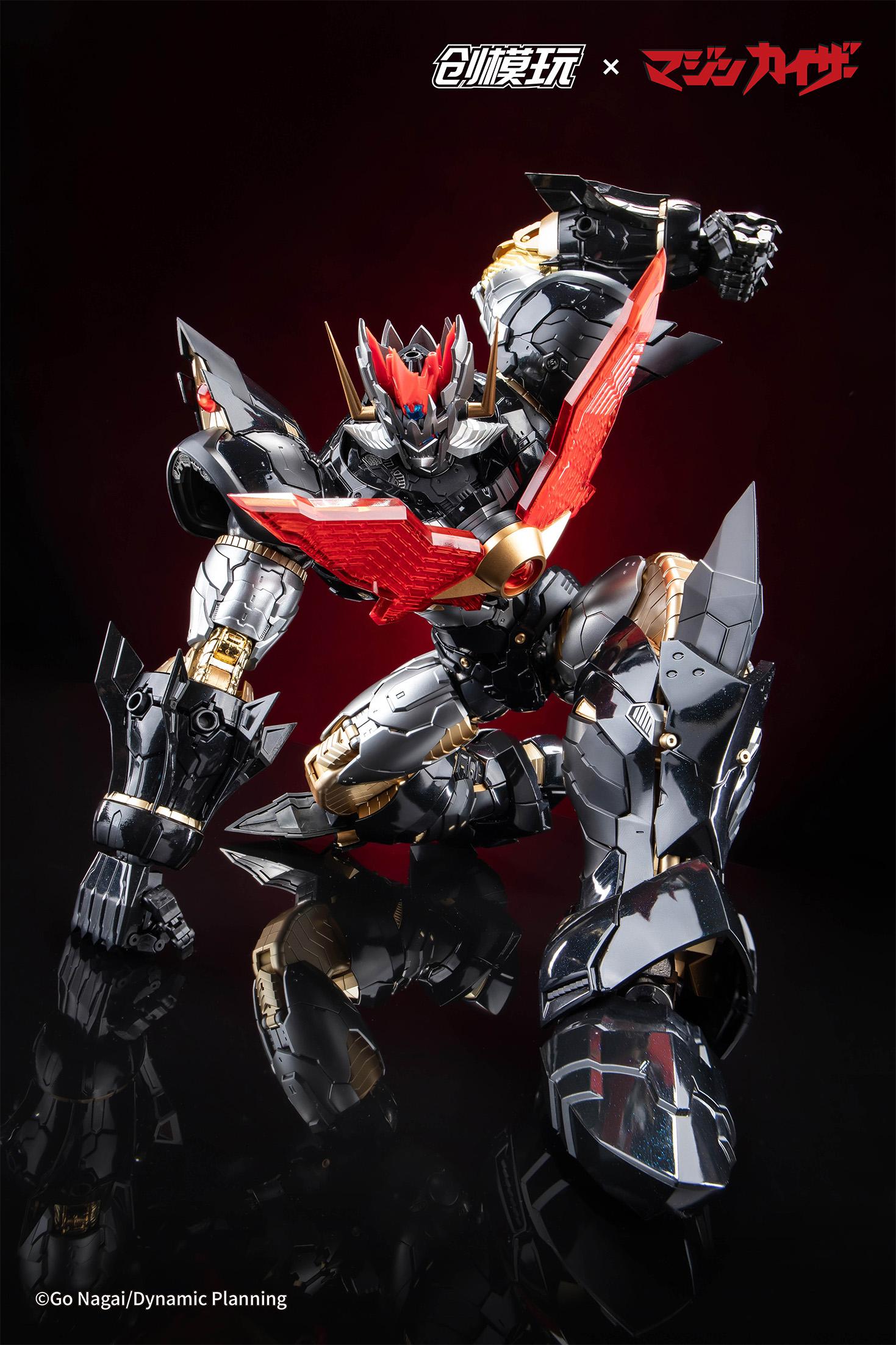 Mazinkaiser alloy frame figure in a detailed kneeling heroic landing pose on a reflective surface.
