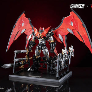 Full display of Mazinkaiser on its custom mechanical base with weapons organized on racks.
