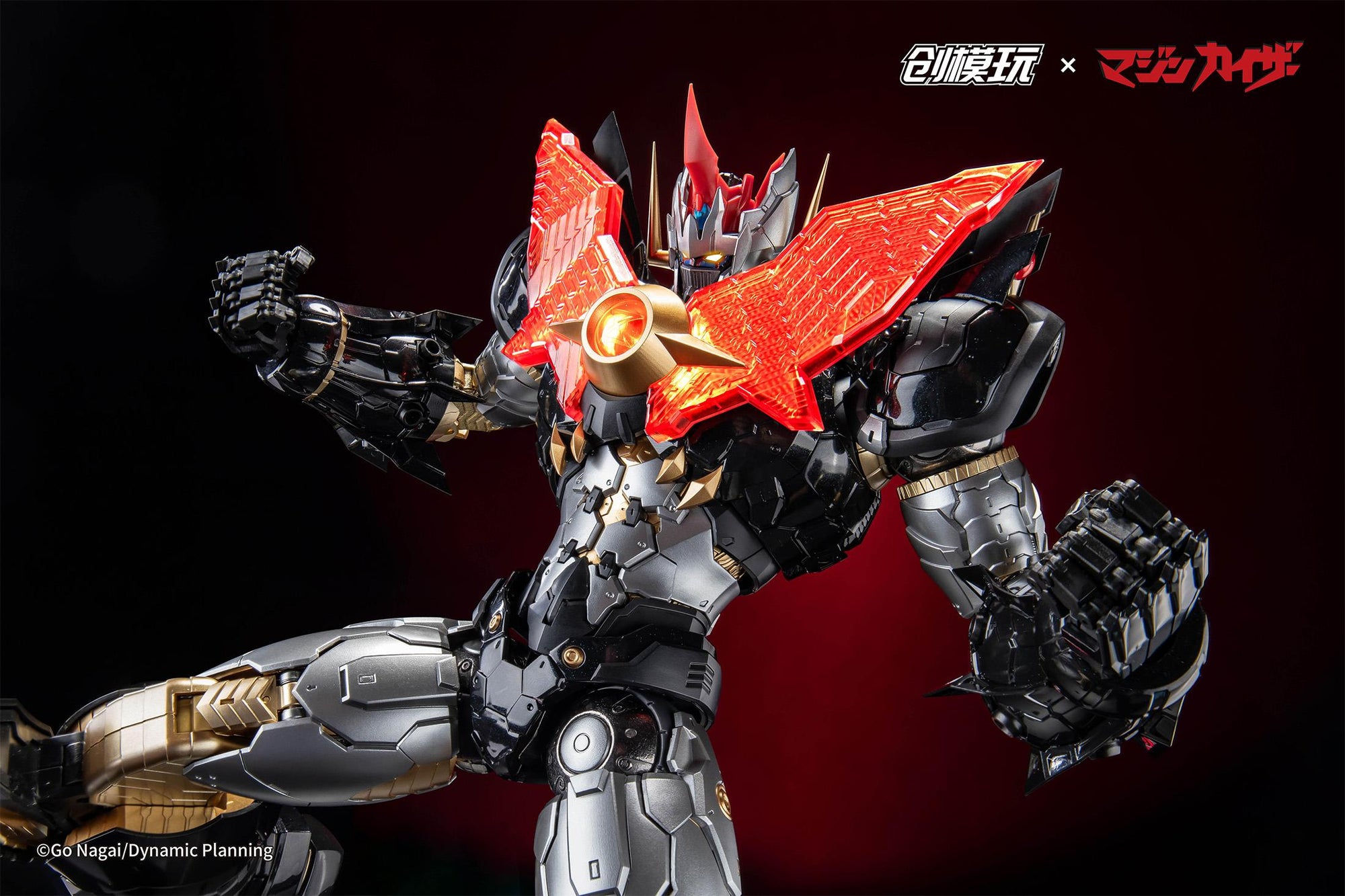 Mazinkaiser figure in a powerful stance with the Fire Blaster LED chest piece glowing brightly.