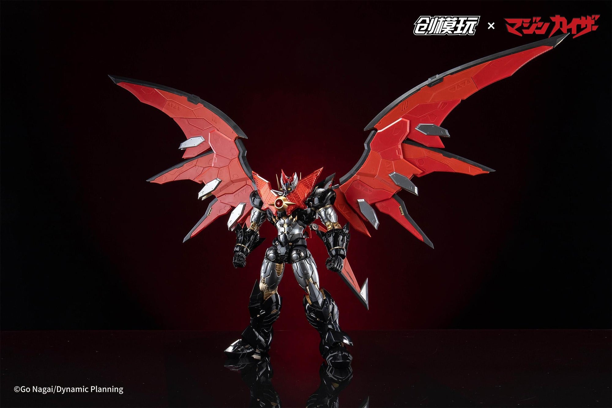 Full standing pose of Mazinkaiser with wings deployed and tail assembly visible.