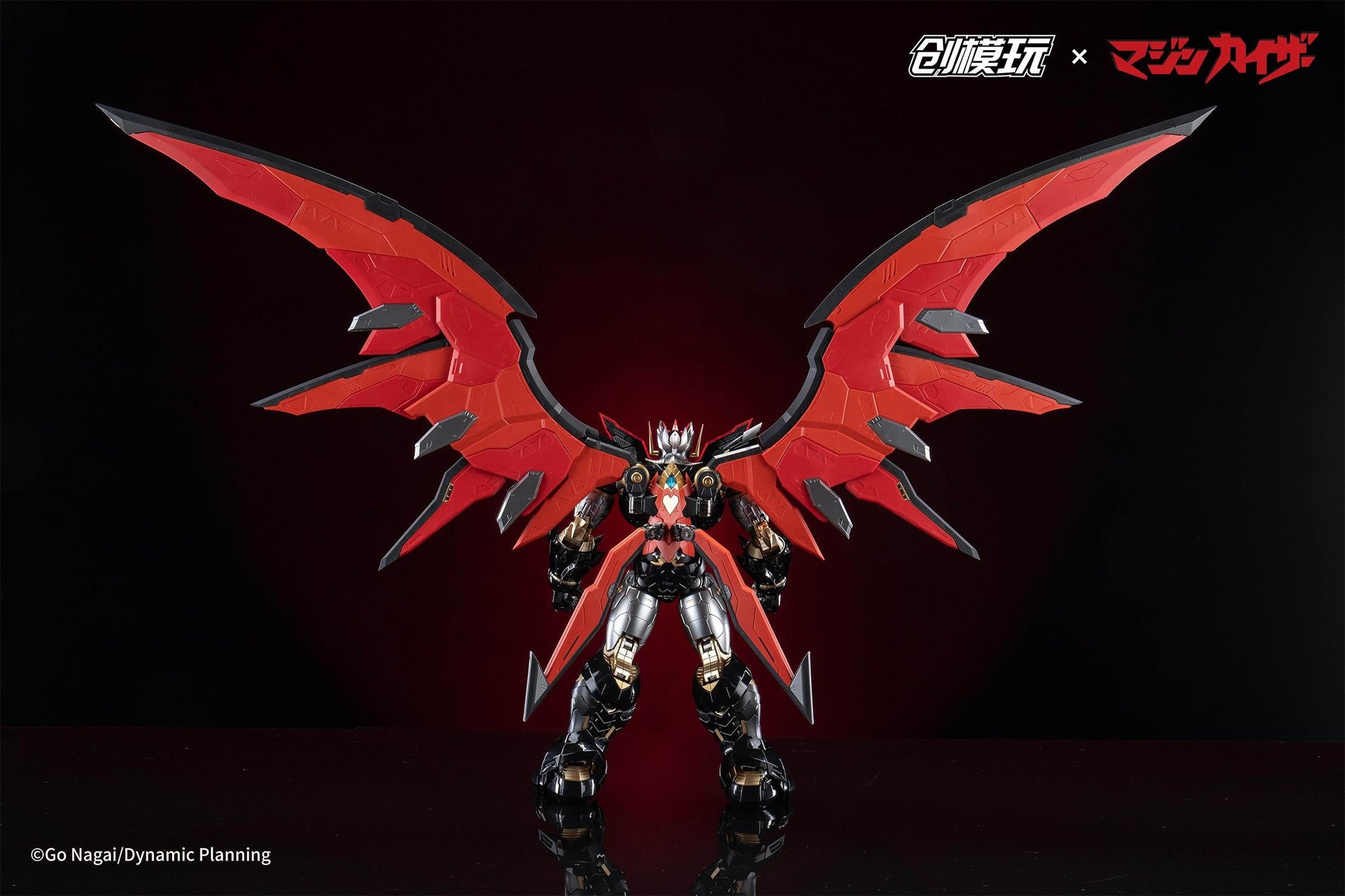 Wide rear view of Mazinkaiser highlighting the impressive wingspan of the red scrander wings.