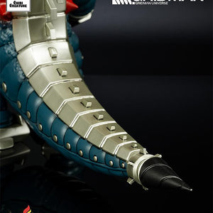 Detailed close-up of the mechanical tail tip of the Mecha Ghoulghilas figure, showcasing the soft vinyl texture and silver finish.