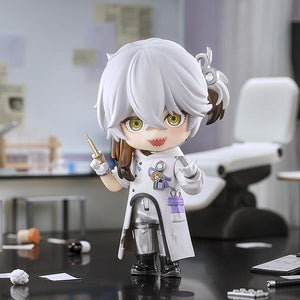 Medicine Pocket Nendoroid with a manic grin and syringe, posed in a highly detailed miniature medical lab diorama with scattered papers and pills.