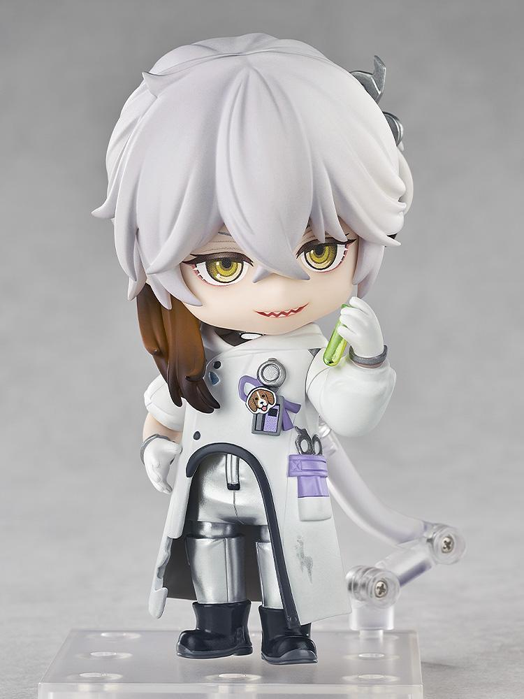 Medicine Pocket Nendoroid with a mischievous smile, holding a small green test tube accessory filled with a mysterious fluid.