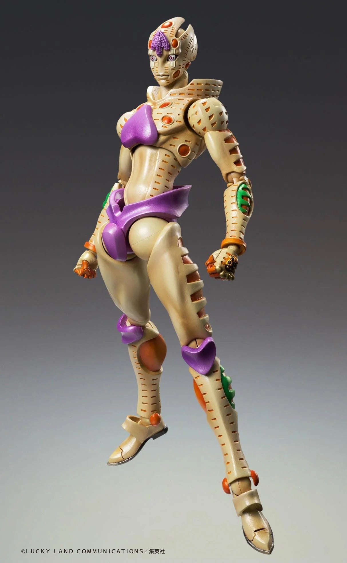 Full frontal view of the Medicos Super Action Statue Gold Experience Requiem (G.E.R.) figure, showcasing its distinct tan and purple armor design.