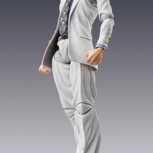 Full side profile of the Medicos Super Action Statue Yoshikage Kira figure, standing in his white suit and green shoes.