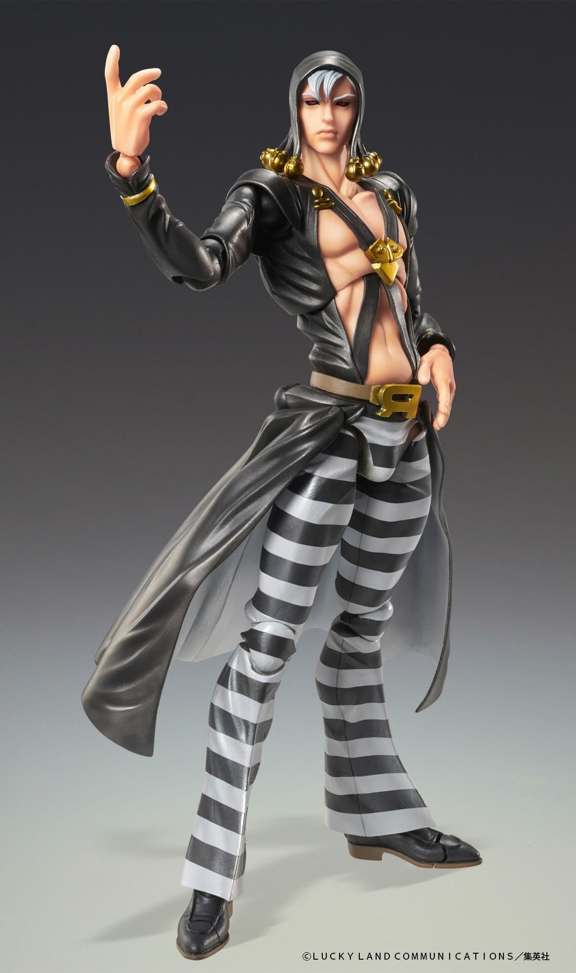 Close-up view of the Risotto Nero action figure highlighting the intricate details of his black hood with gold dangling ornaments and crossed chest strap armor.