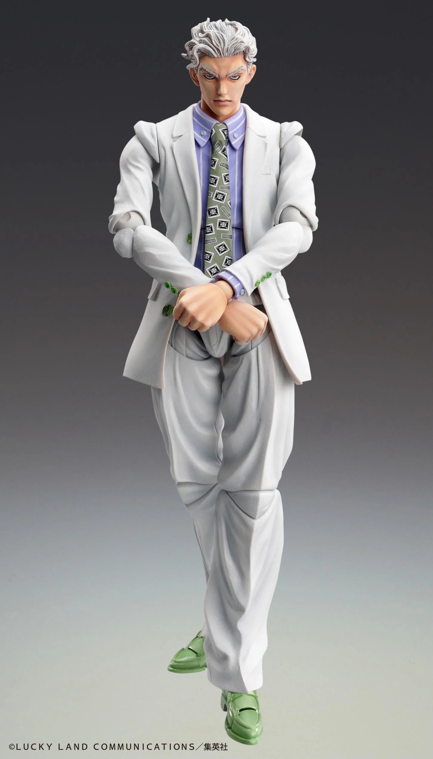 Yoshikage Kira figure in a frontal pose with his arms crossed over his chest, wearing the light green patterned tie.