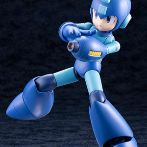 Dynamic airborne stance of the Grande Scale Mega Man 11 kit aiming the Mega Buster downward with two hands.