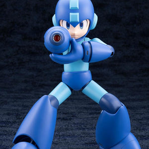 Frontal view of Mega Man aiming the Mega Buster arm cannon directly forward while steadying it with his other hand.