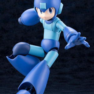 Mid-air jumping and kicking pose of the Mega Man 11 Grande Scale model kit with an open left hand.