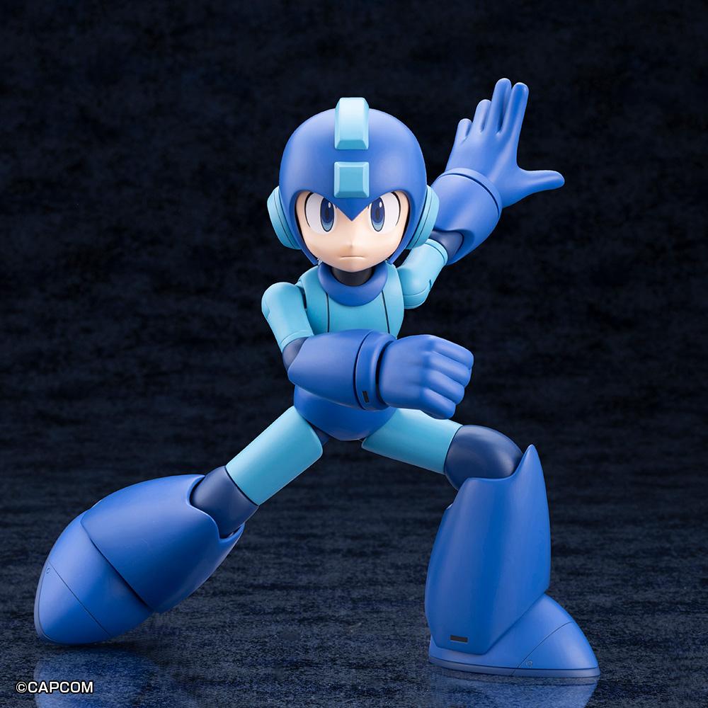 Dynamic combat stance of the Mega Man 11 Grande Scale figure with raised open palm and wide leg articulation.