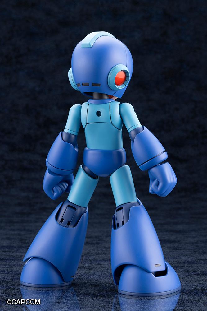 Rear angle view of the Mega Man 11 Grande Scale model kit showcasing helmet seams, ear covers, and joint articulation points.