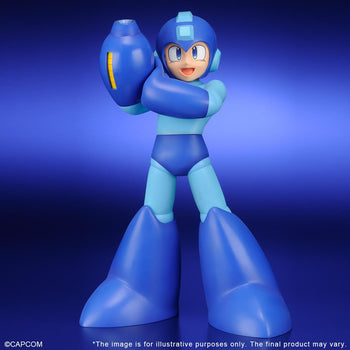 Front view of the Mega Man Gigantic Series large-scale vinyl figure, showing his classic blue armor, cheerful smiling expression, and ready stance with his Mega Buster raised.