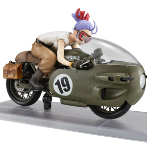 A rear-angled view of the Bulma figure and motorcycle, highlighting the leather saddlebags and the figure's intense racing pose.