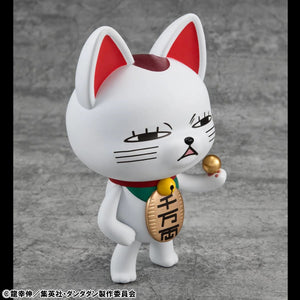 A close-up of the Turbo Granny Fortune Cat figure, showing the grumpy expression and the small golden ball in its hand.