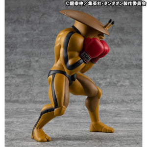 Right profile view of the Occultic Sofubi Collection Dover Demon figure, showing its defensive fighting posture and detailed red boxing gloves.