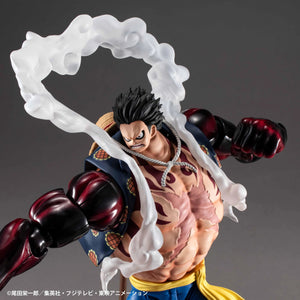 A close-up of the Luffy Gear 4 figure's upper body, highlighting the cracked skin texture, angry expression, and white steam effects.